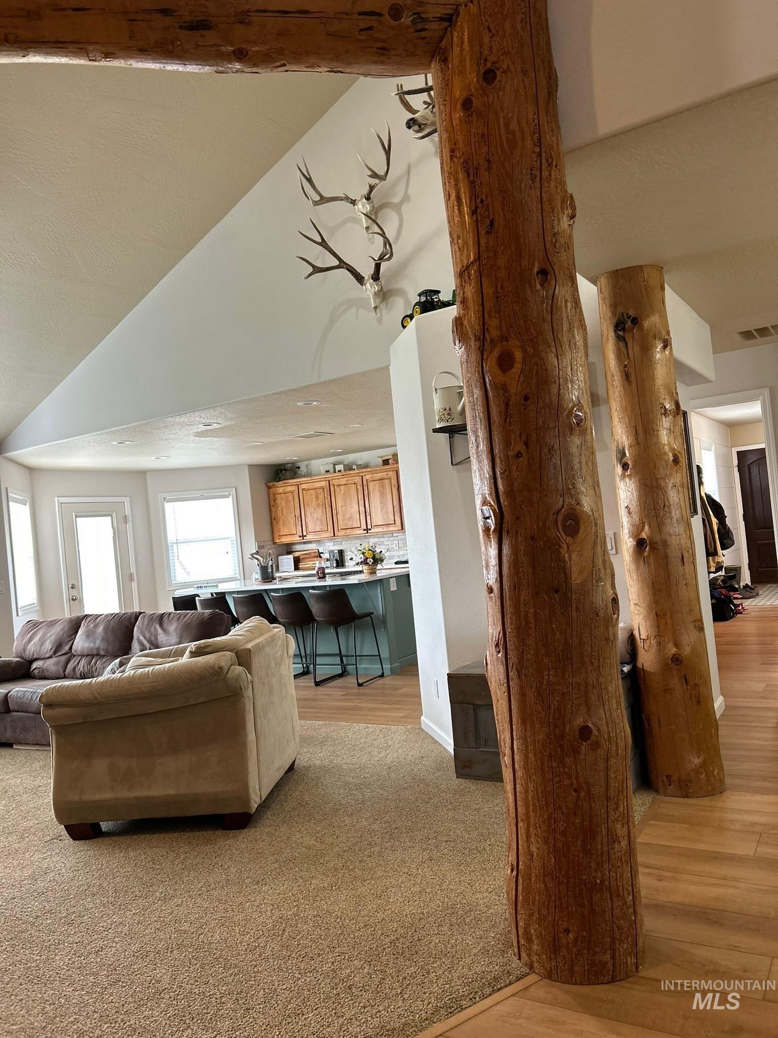 3091 Echo Road Nyssa, OR 97913 - Photo 22 of 36 Living area featuring light wood-style floors and high vaulted ceiling