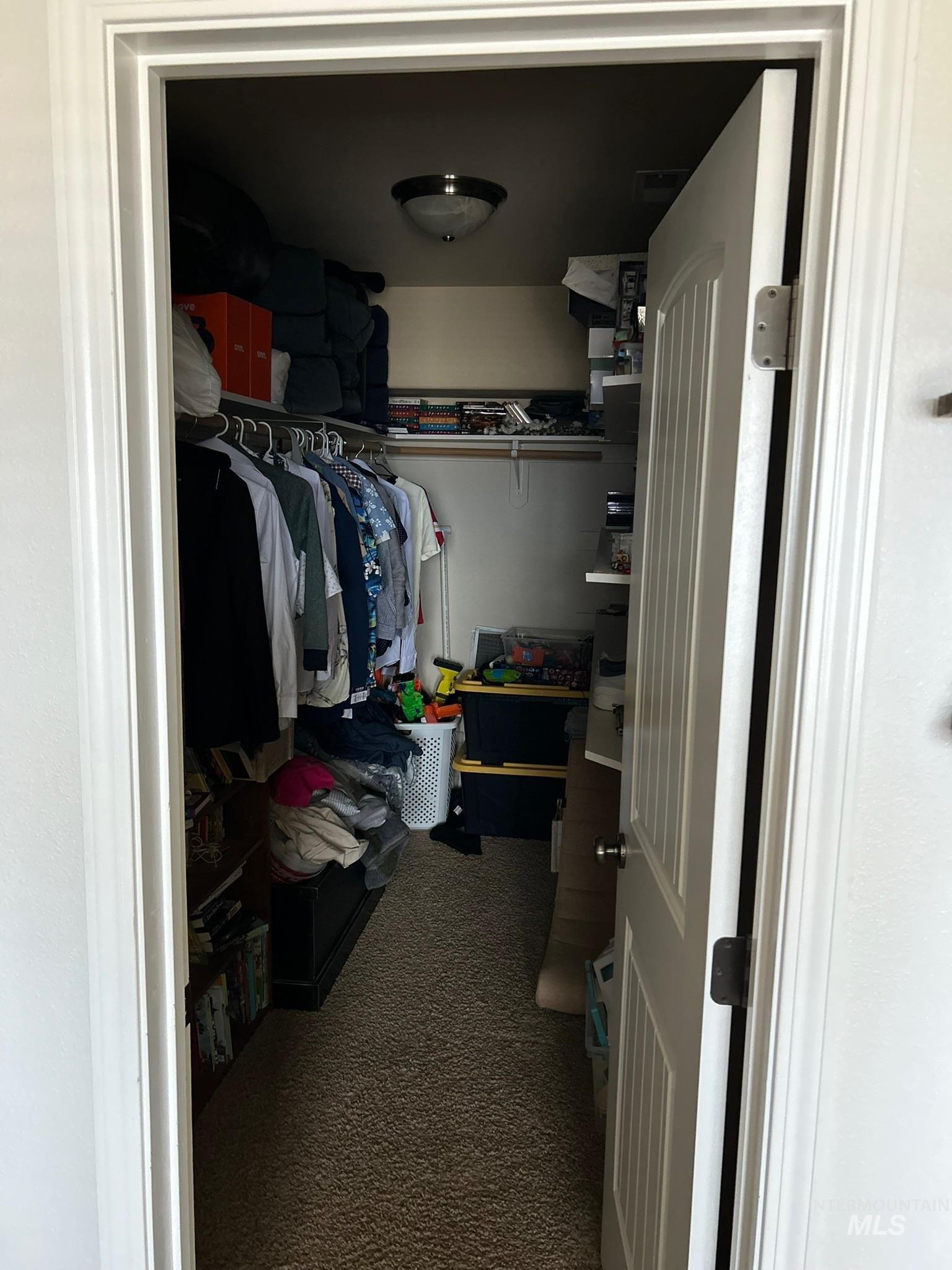 3091 Echo Road Nyssa, OR 97913 - Photo 34 of 36 Walk in closet featuring dark colored carpet