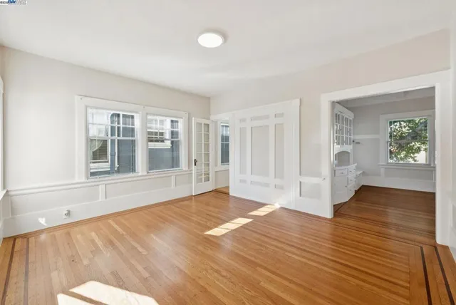 a view of living room with furniture and floor to ceiling window