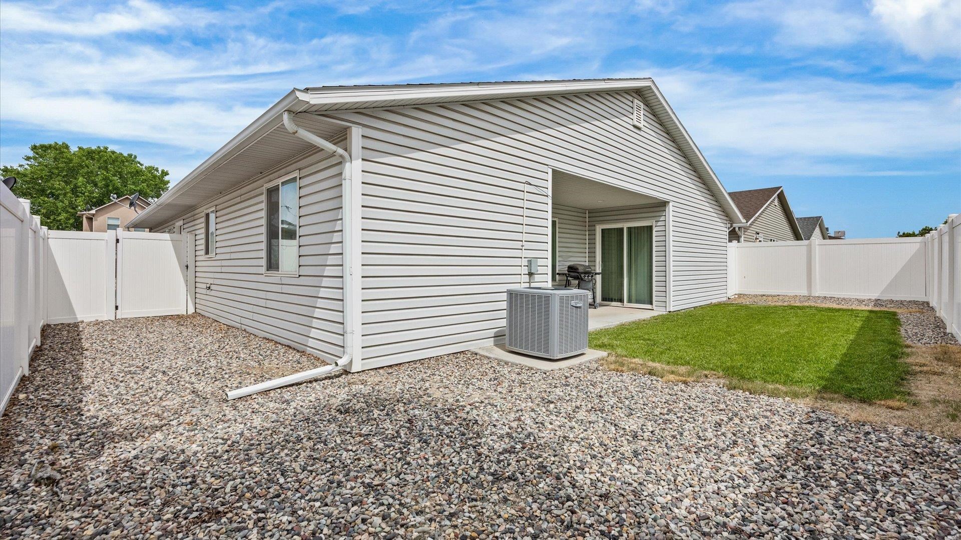 420-29 29 1/2 Road Grand Junction, CO 81504 - Photo 24 of 26 a view of a house with backyard and sitting area