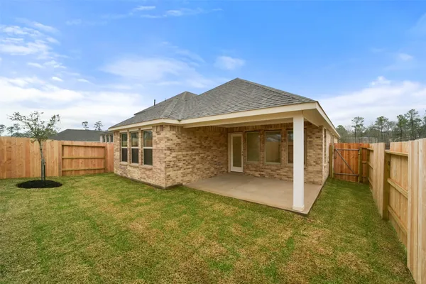 a front view of house with yard