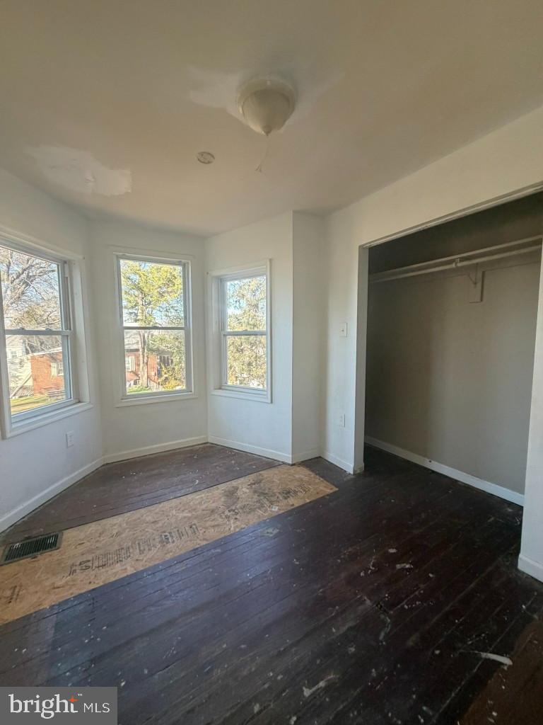 314 57th Street Northeast Washington, DC 20019 - Photo 12 of 19 an empty room with windows