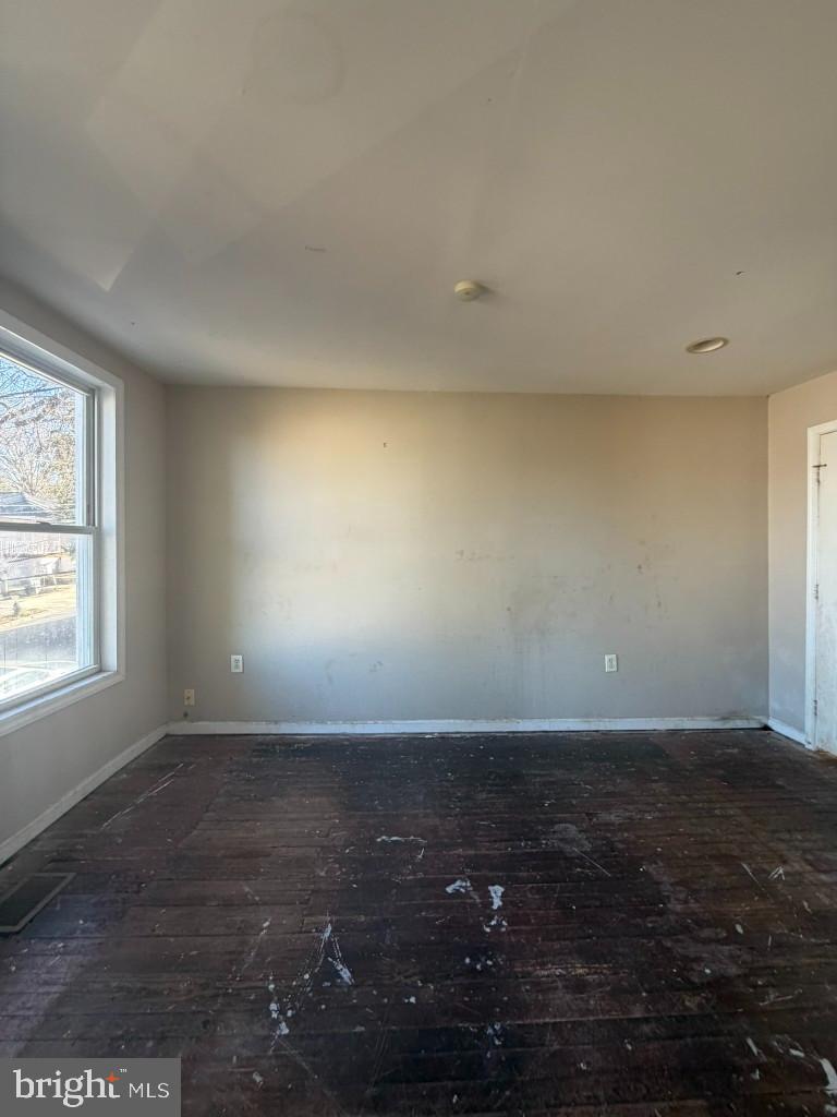 314 57th Street Northeast Washington, DC 20019 - Photo 13 of 19 an empty room with a window
