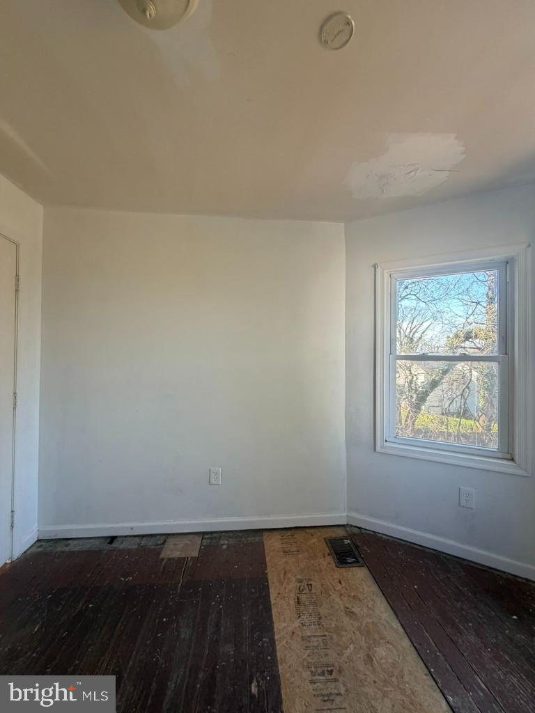 314 57th Street Northeast Washington, DC 20019 - Photo 14 of 19 an empty room with a window