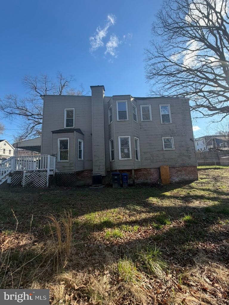 314 57th Street Northeast Washington, DC 20019 - Photo 18 of 19 a view of a house with a yard