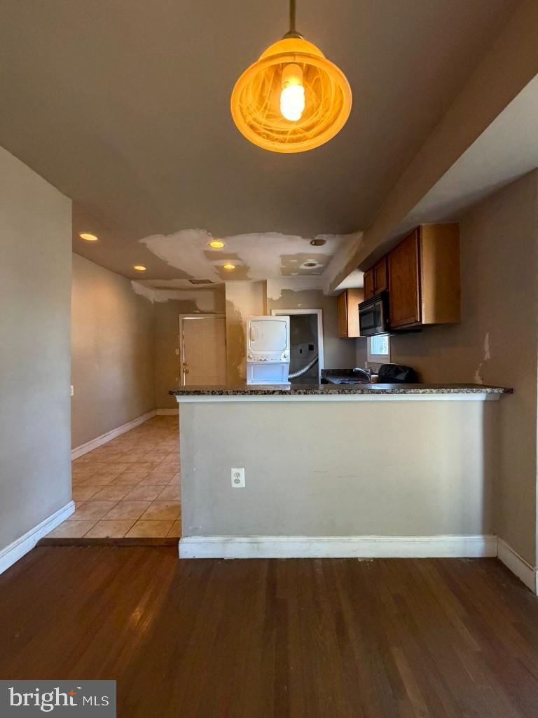 314 57th Street Northeast Washington, DC 20019 - Photo 5 of 19 a view of kitchen and wooden floor