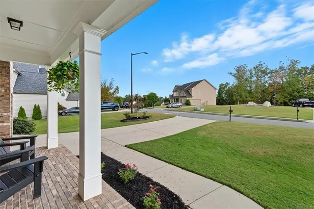 a living room with furniture or couch and a flat screen tv