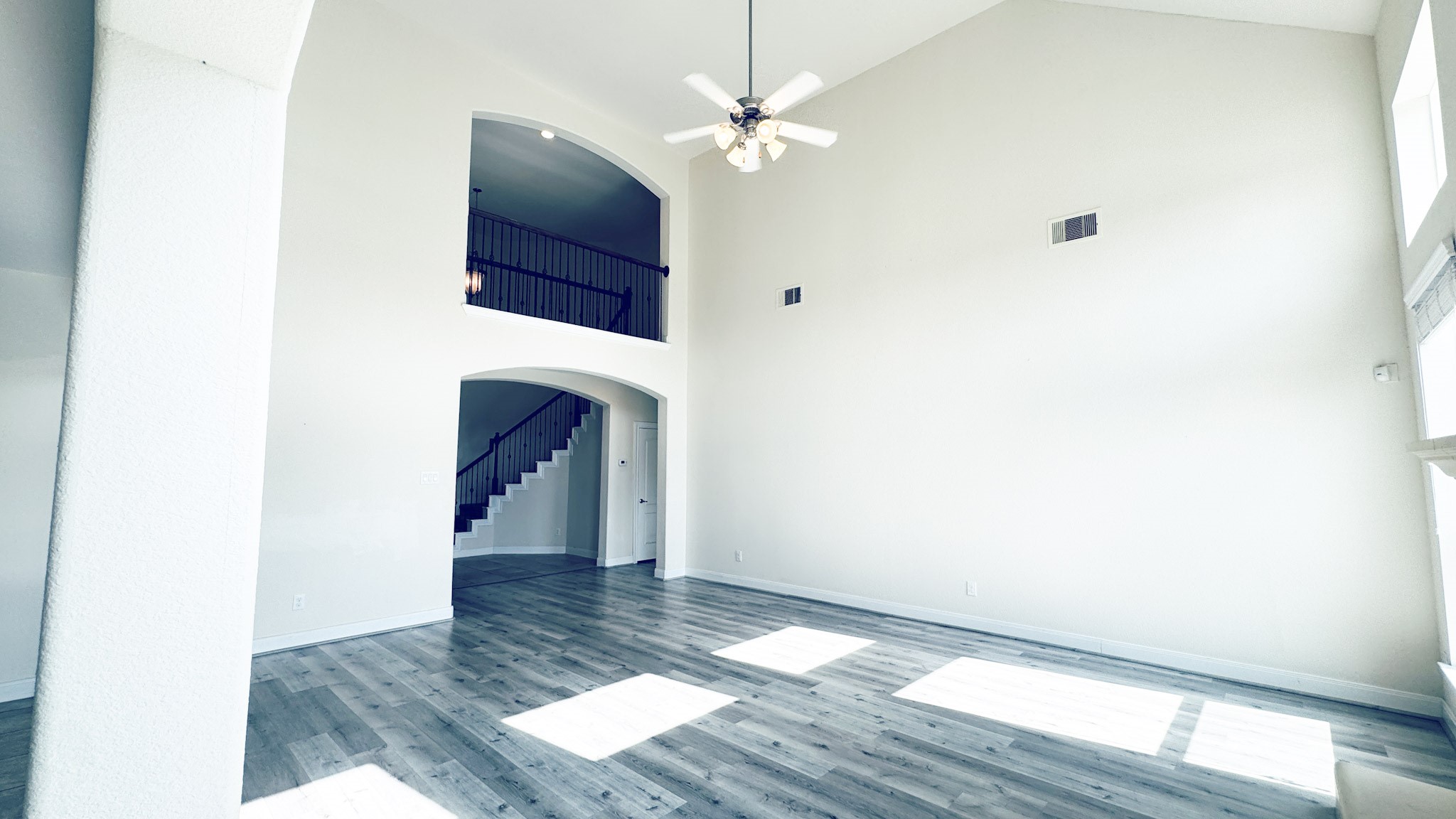 1236 Laurel Loop Angleton, TX 77515 - Photo 4 of 17 a view of a hallway with wooden floor