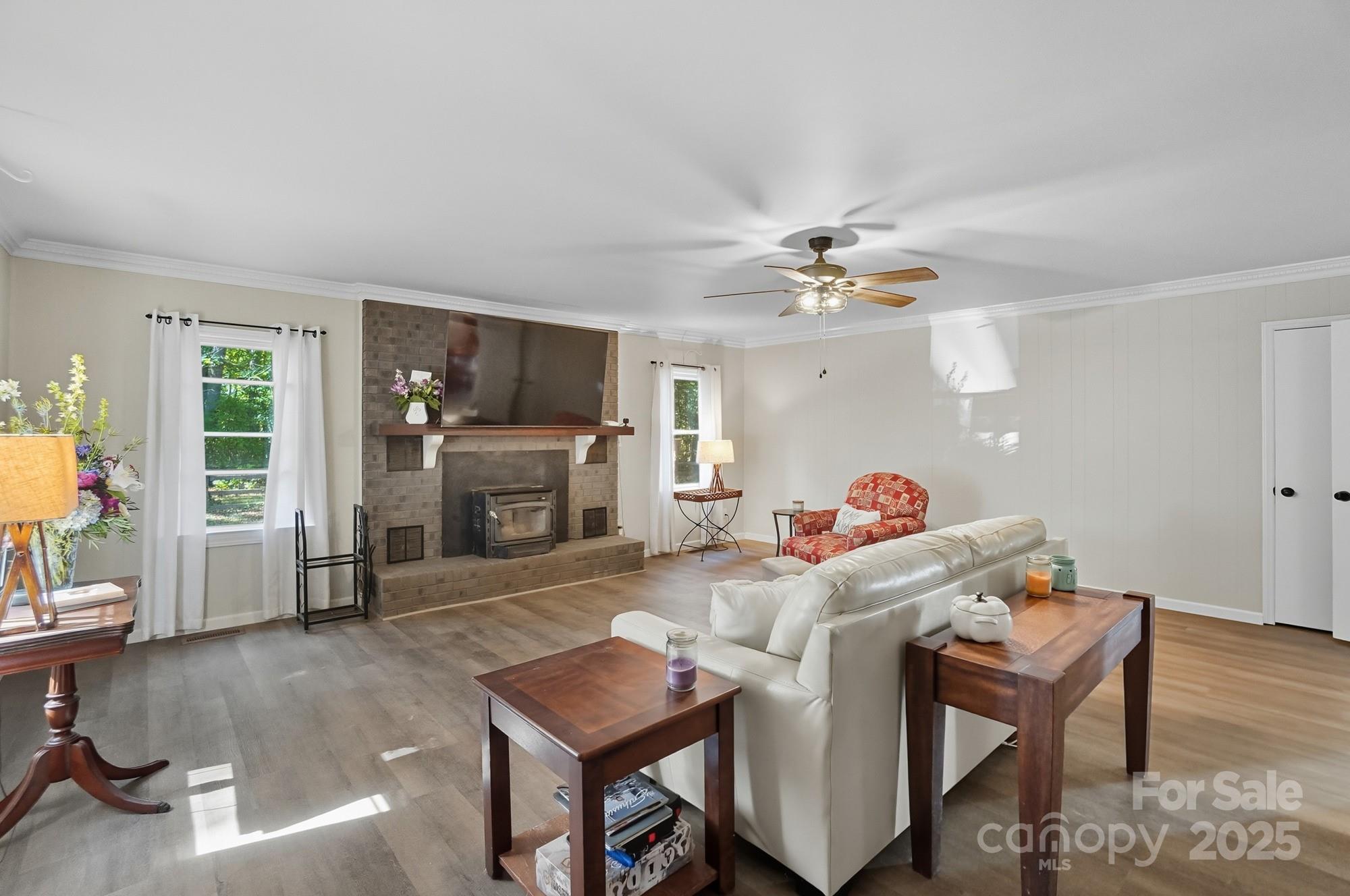 109 Carter Road Monroe, NC 28110 - Photo 12 of 48 a living room with furniture and a fireplace