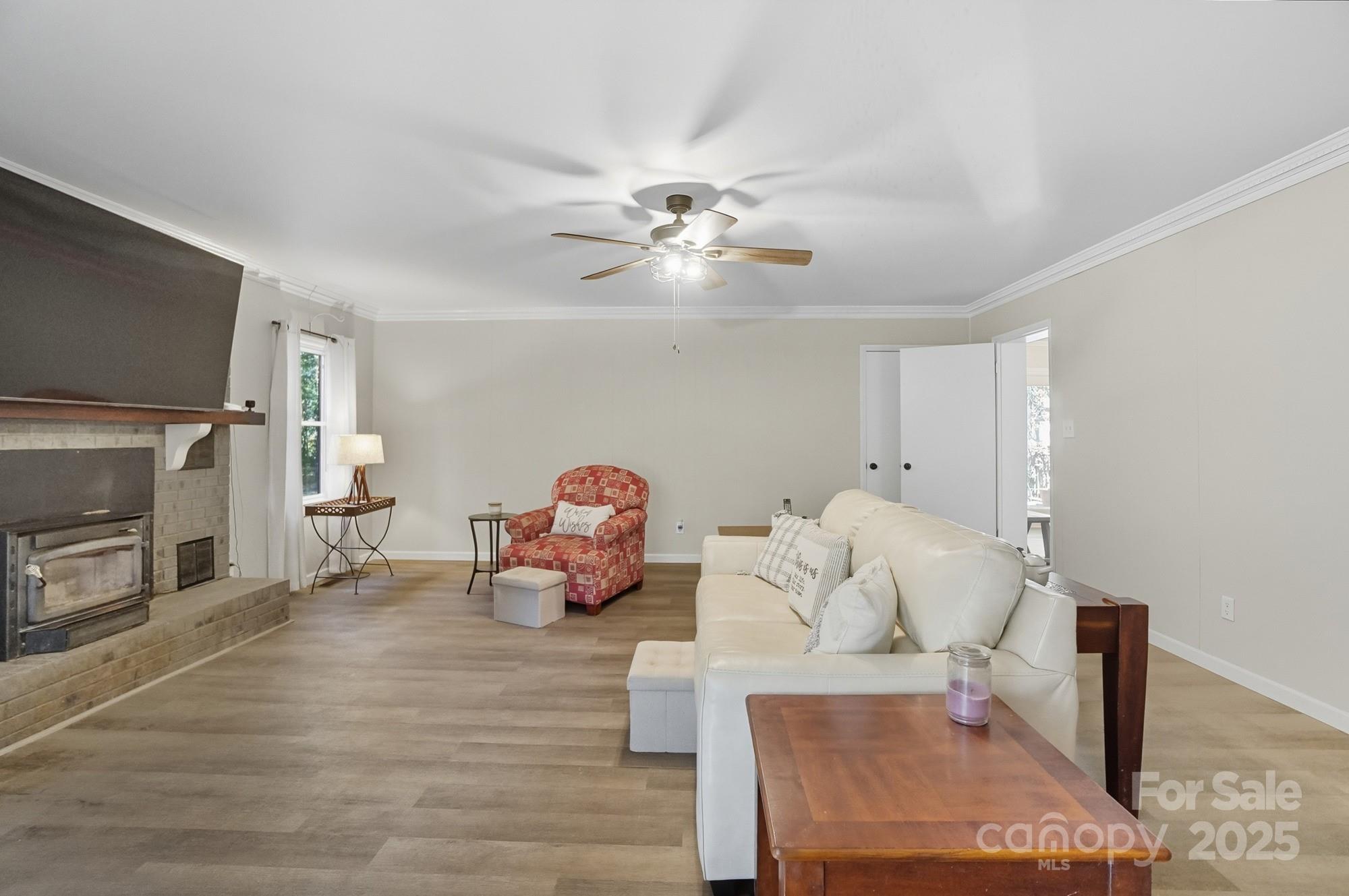 109 Carter Road Monroe, NC 28110 - Photo 15 of 48 a living room with furniture and a fireplace
