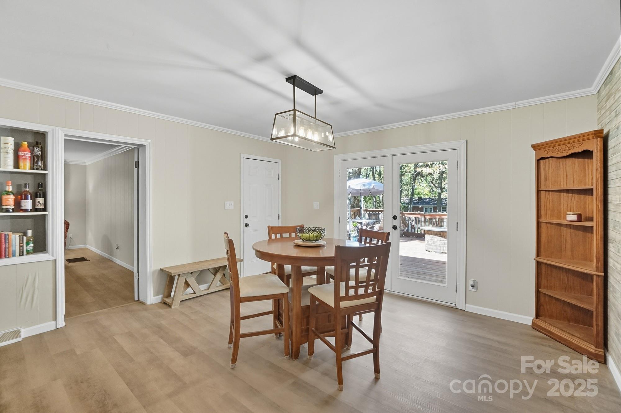 109 Carter Road Monroe, NC 28110 - Photo 23 of 48 a view of a dining room with furniture and chandelier