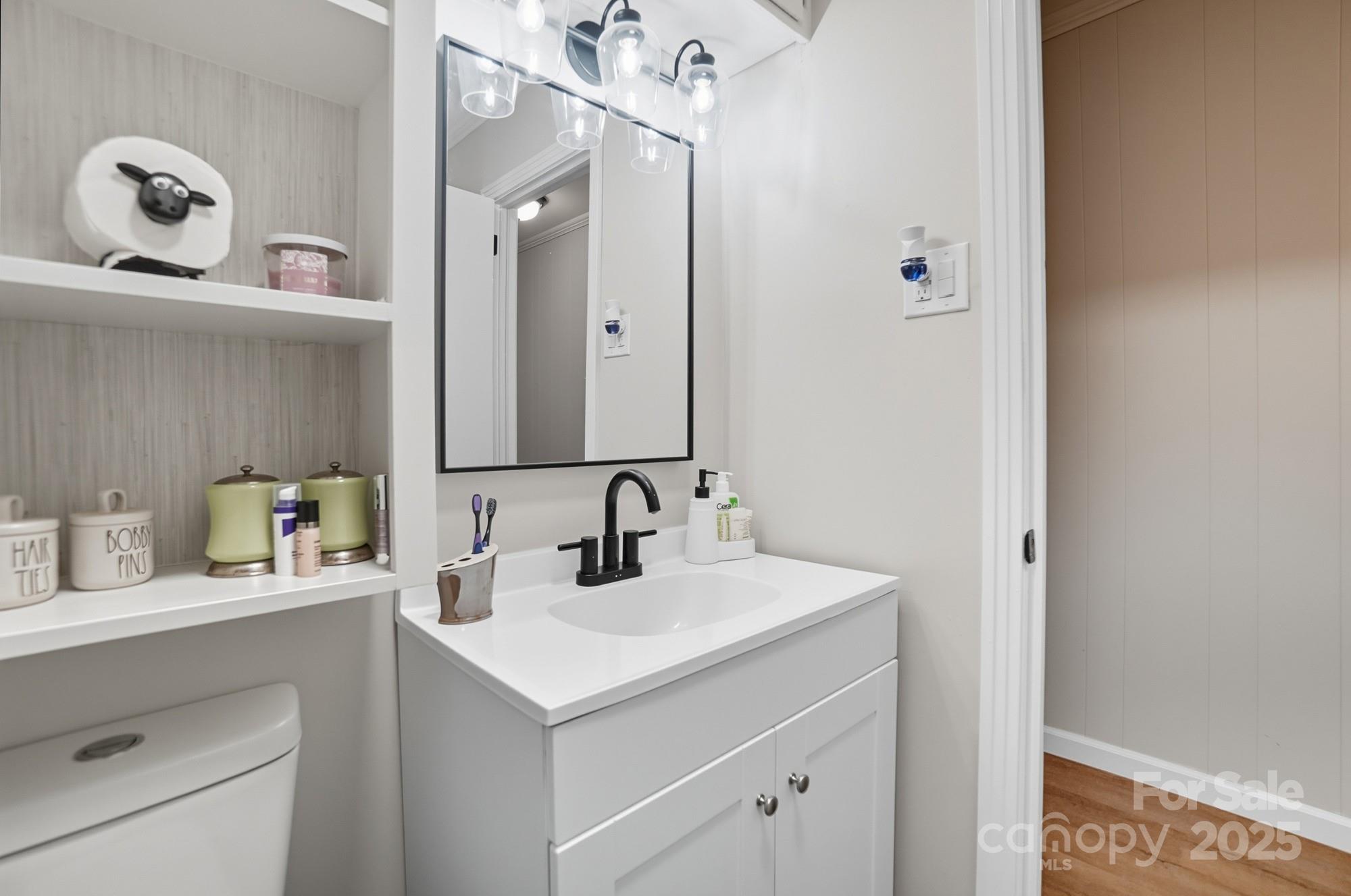 109 Carter Road Monroe, NC 28110 - Photo 34 of 48 a bathroom with a sink and a mirror