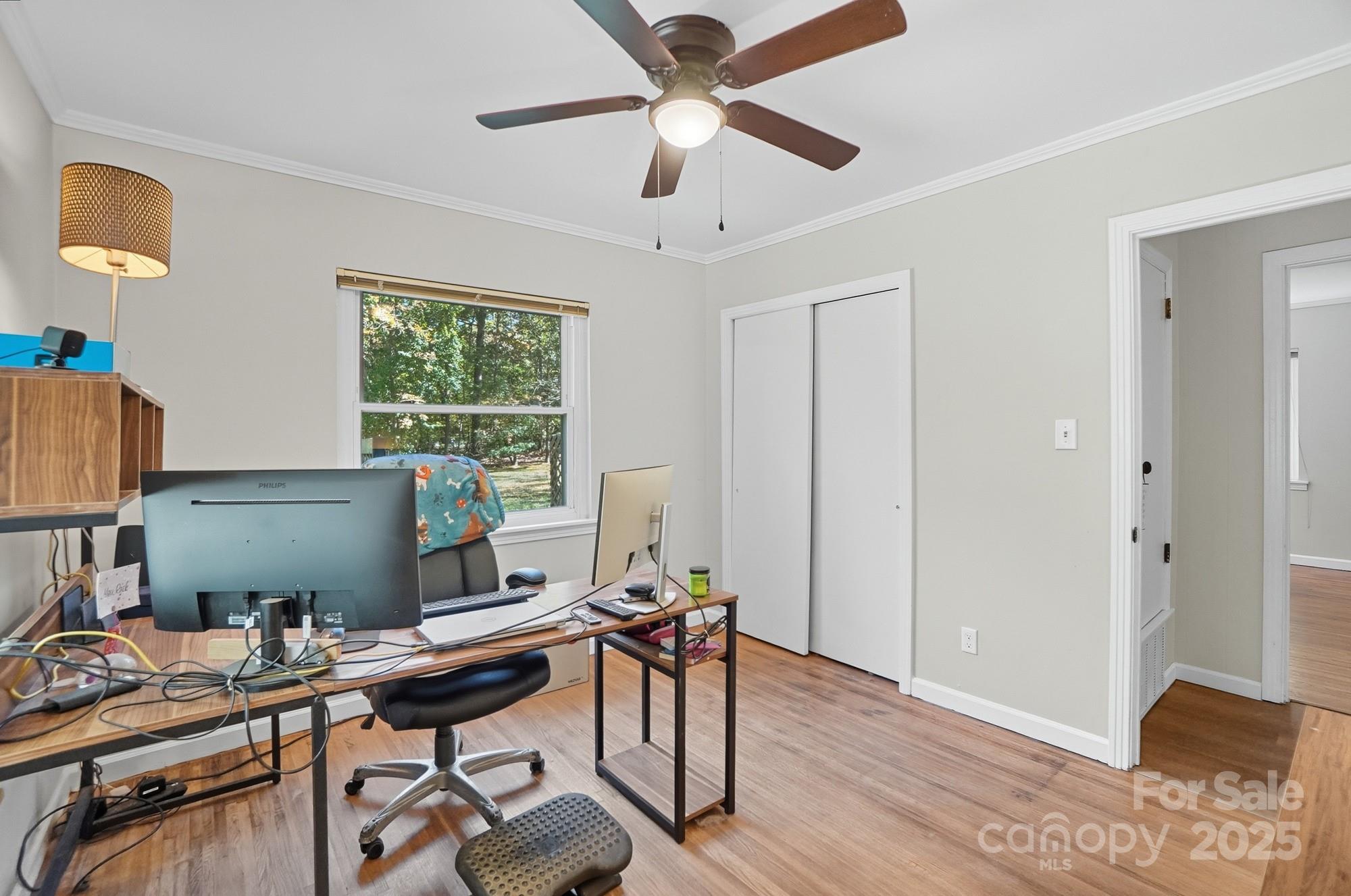 109 Carter Road Monroe, NC 28110 - Photo 36 of 48 a workspace with furniture and a window