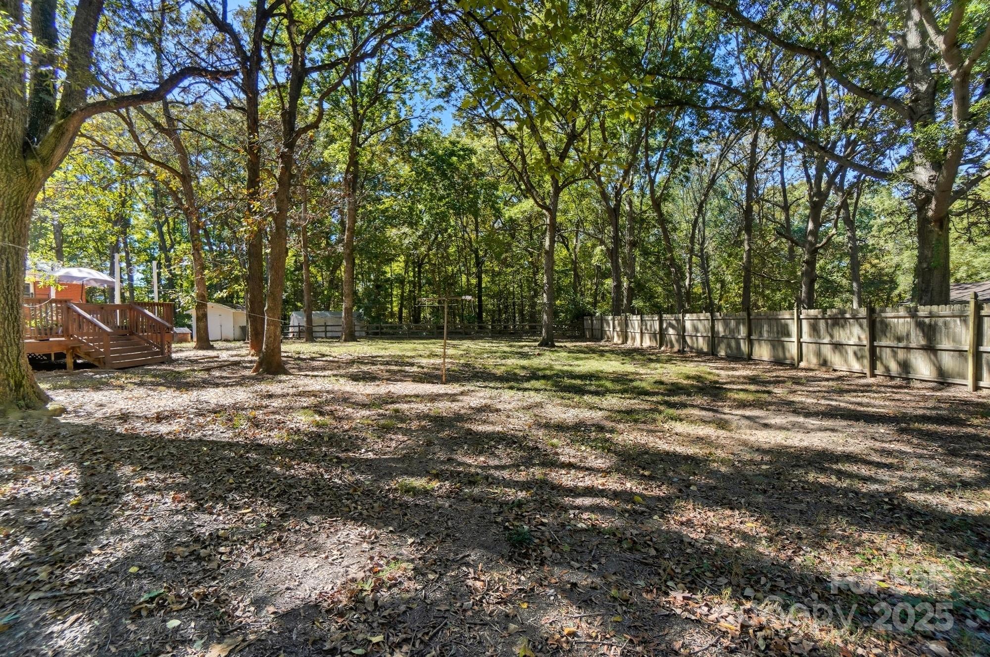109 Carter Road Monroe, NC 28110 - Photo 46 of 48 a view of outdoor space with trees