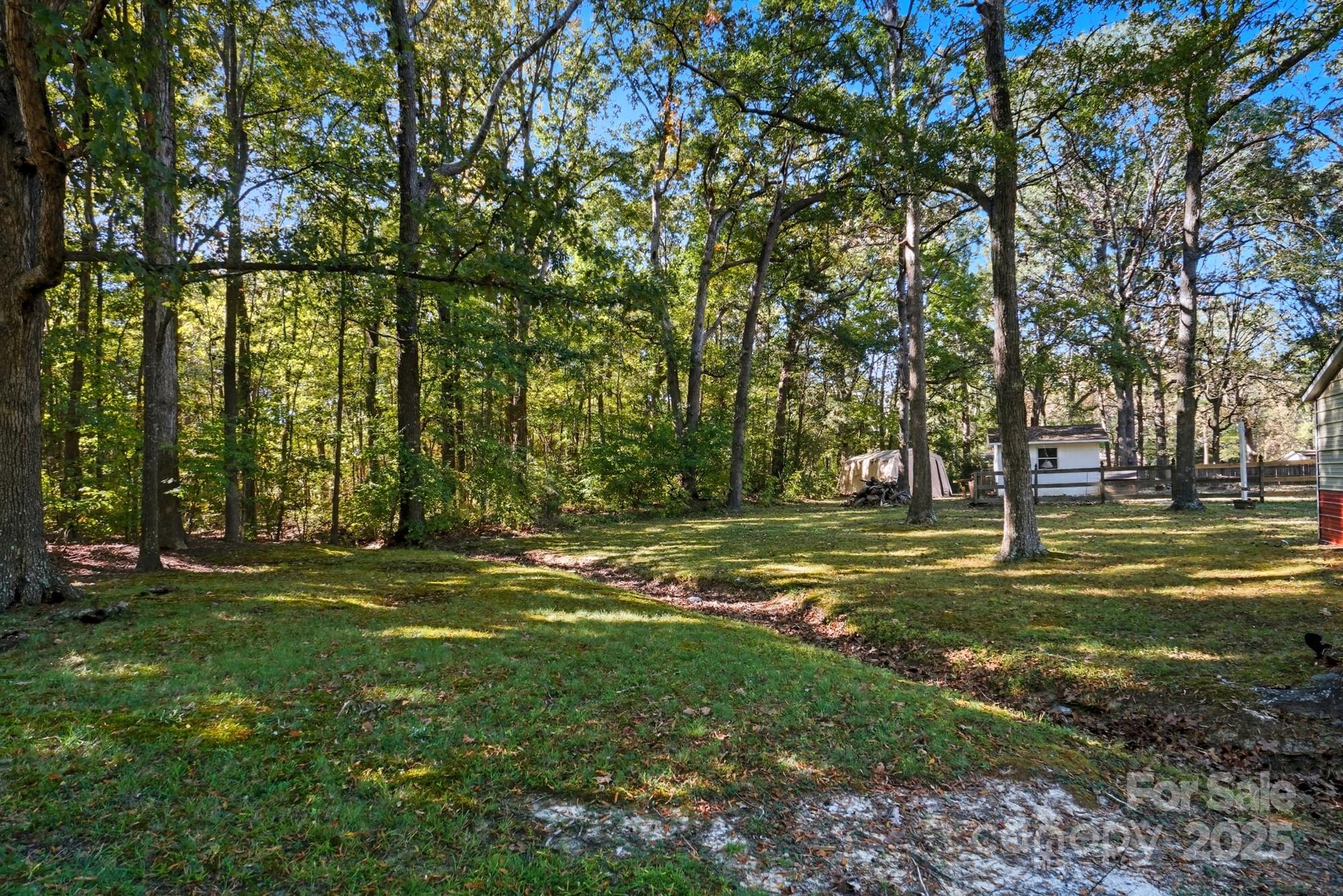 109 Carter Road Monroe, NC 28110 - Photo 47 of 48 a view of a trees in a yard