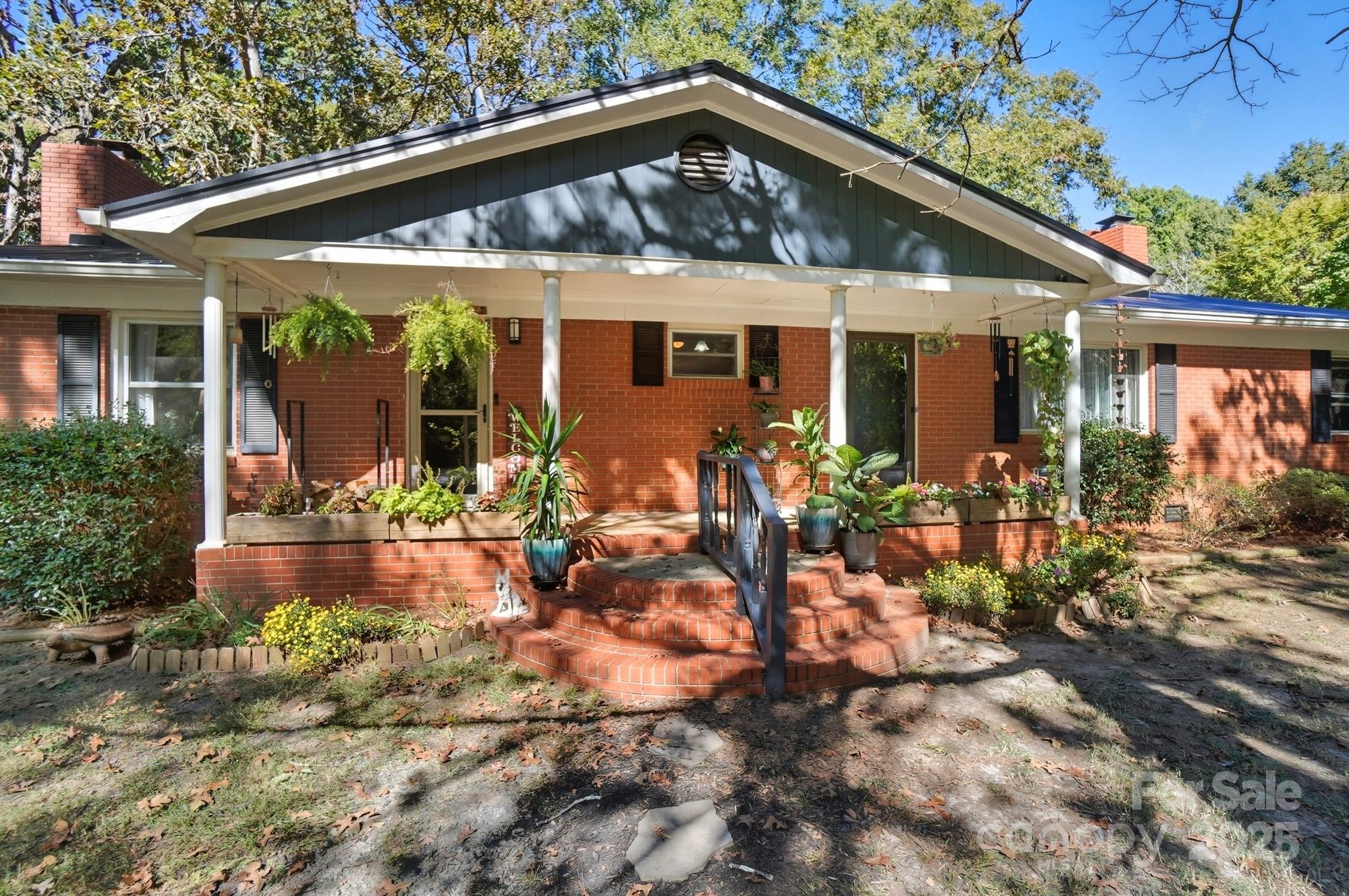 109 Carter Road Monroe, NC 28110 - Photo 6 of 48 front view of a house with a porch