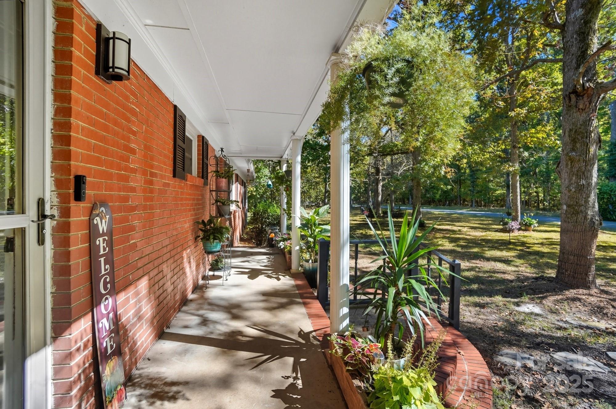 109 Carter Road Monroe, NC 28110 - Photo 10 of 48 a backyard of a house with lots of green space