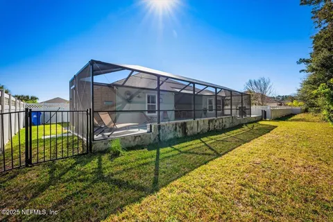 a view of yard and swimming pool