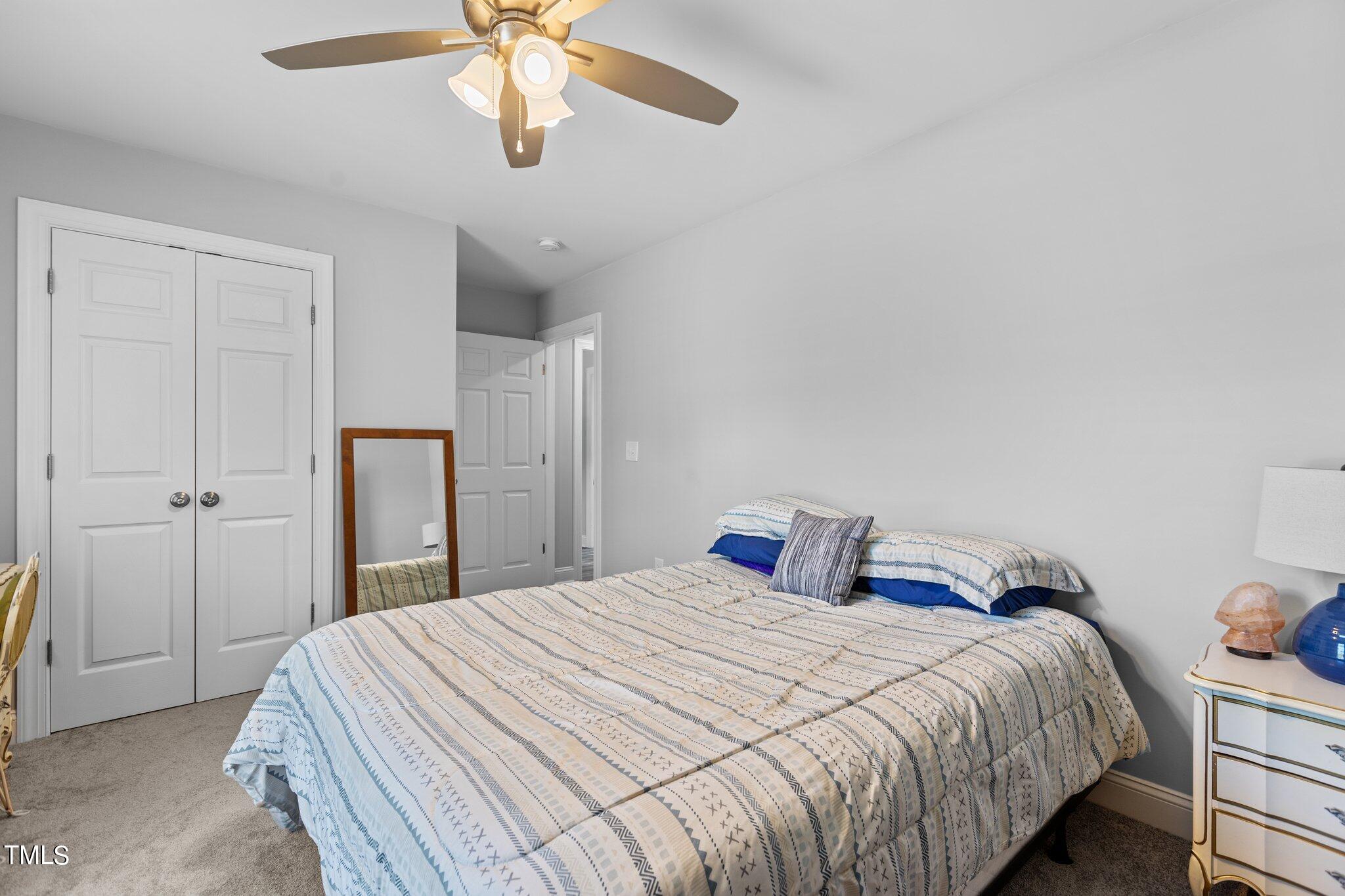 7089 Finch Road Bailey, NC 27807 - Photo 26 of 43 a bedroom with bed and window