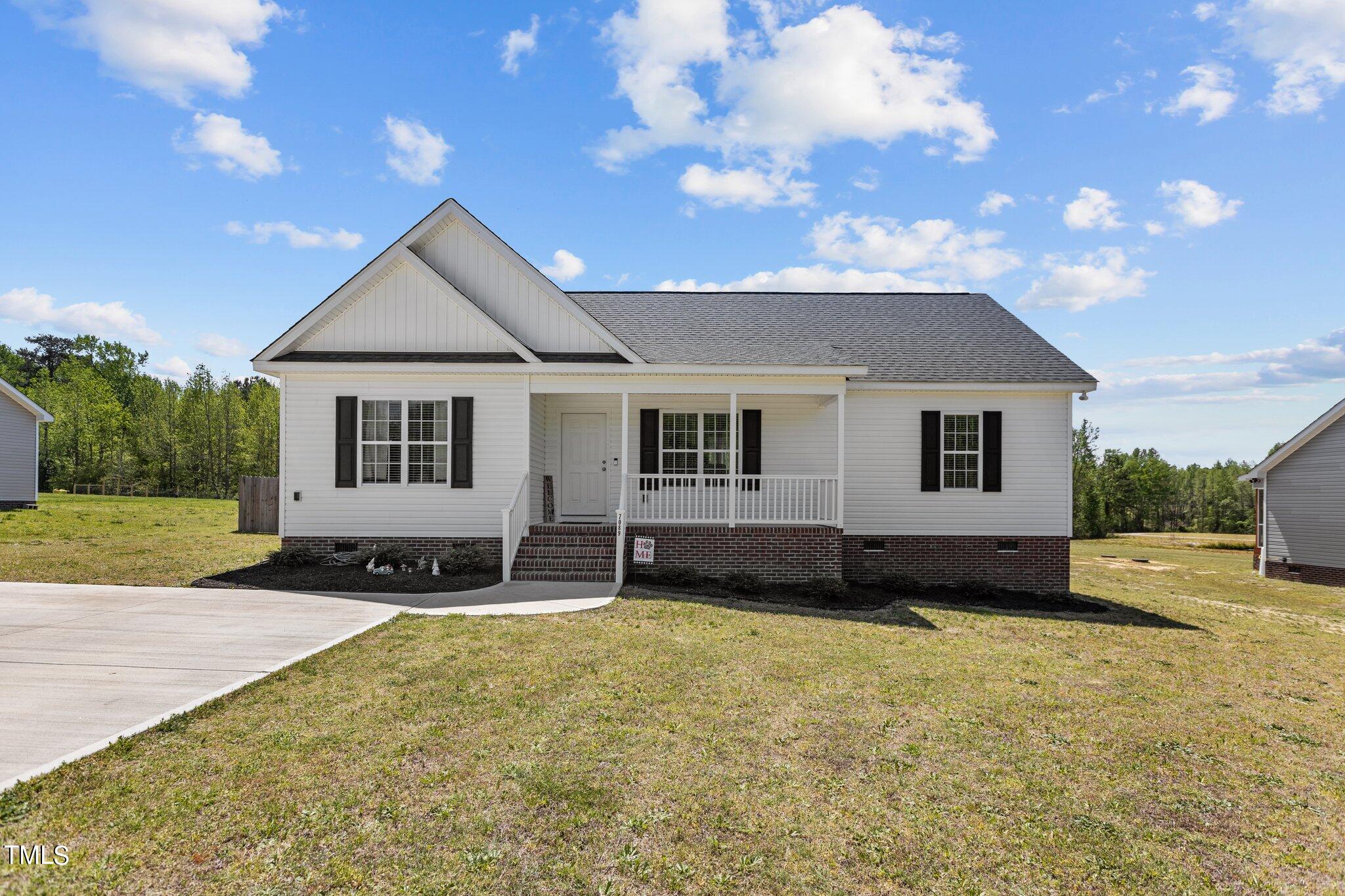 7089 Finch Road Bailey, NC 27807 - Photo 38 of 43 front view of a house with a yard