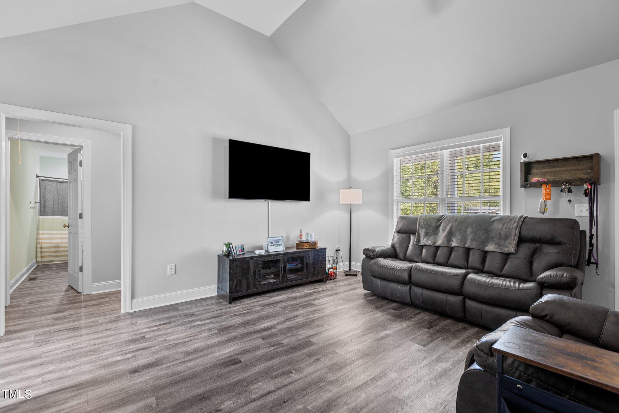 7089 Finch Road Bailey, NC 27807 - Photo 5 of 43 a living room with furniture and a flat screen tv