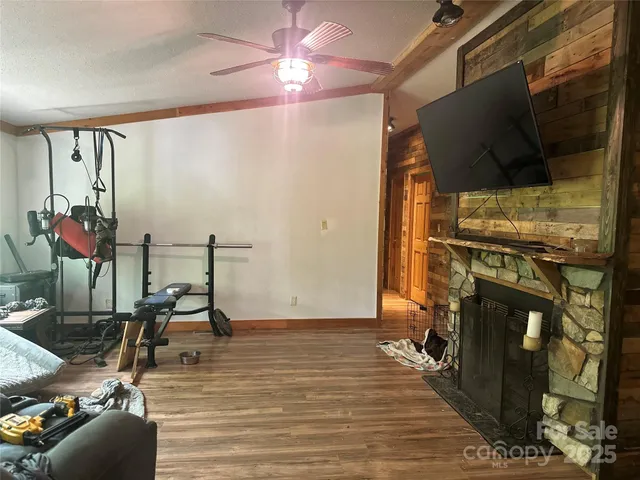 a view of a room with gym equipment