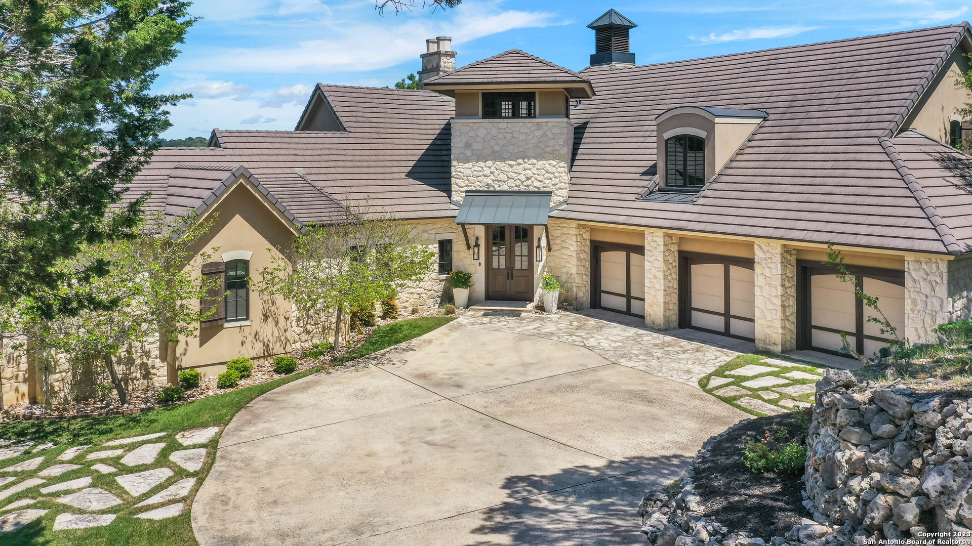 199 Riverwood Boerne, TX 78006 - Photo 1 of 1 a front view of a house with garden