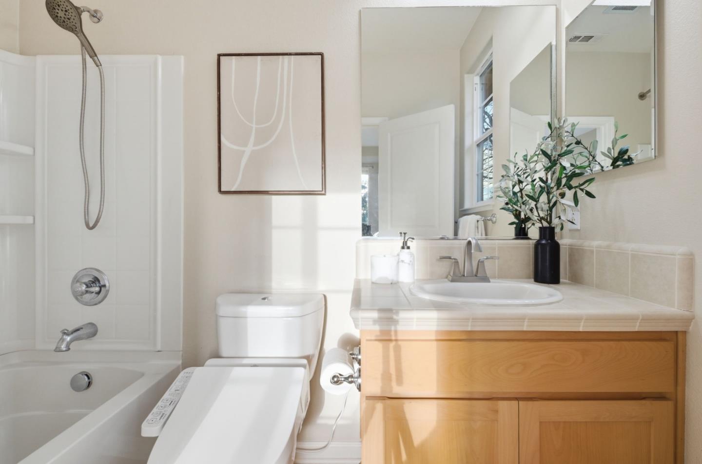 2070 Almaden Road San Jose, CA 95125 - Photo 15 of 36 a bathroom with a tub sink and mirror