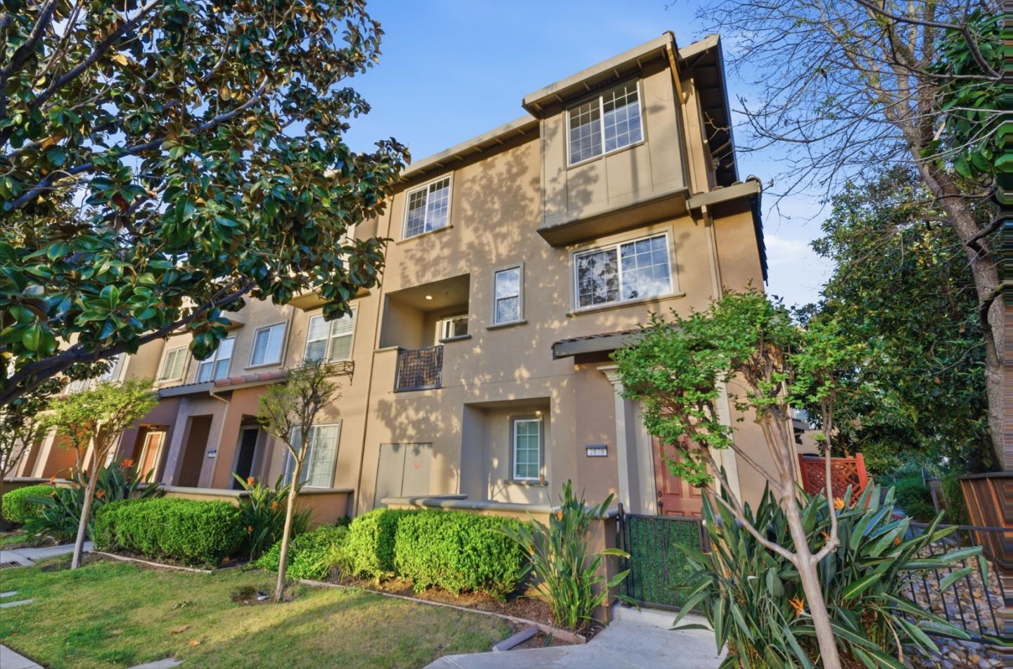 2070 Almaden Road San Jose, CA 95125 - Photo 2 of 36 a view of a brick building next to a yard