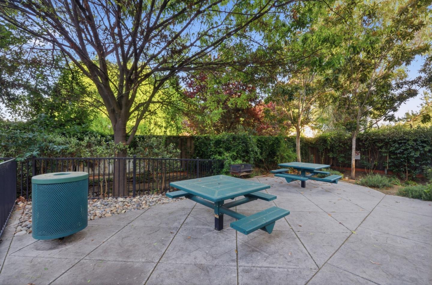 2070 Almaden Road San Jose, CA 95125 - Photo 26 of 36 a view of a backyard with plants and a bench