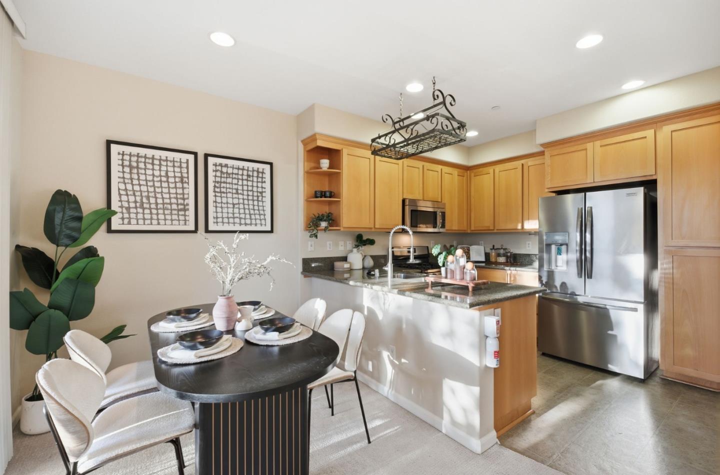 2070 Almaden Road San Jose, CA 95125 - Photo 8 of 36 a kitchen with sink refrigerator dining table and chairs