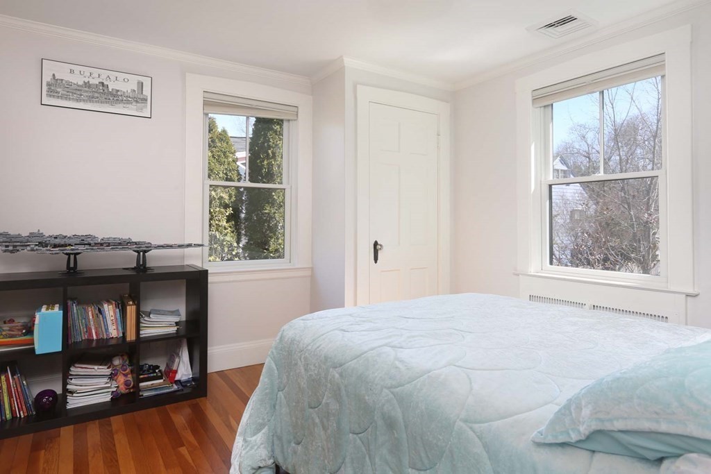 10 Beverly Road Newton, MA 02461 - Photo 12 of 19 a bedroom with a bed and a window