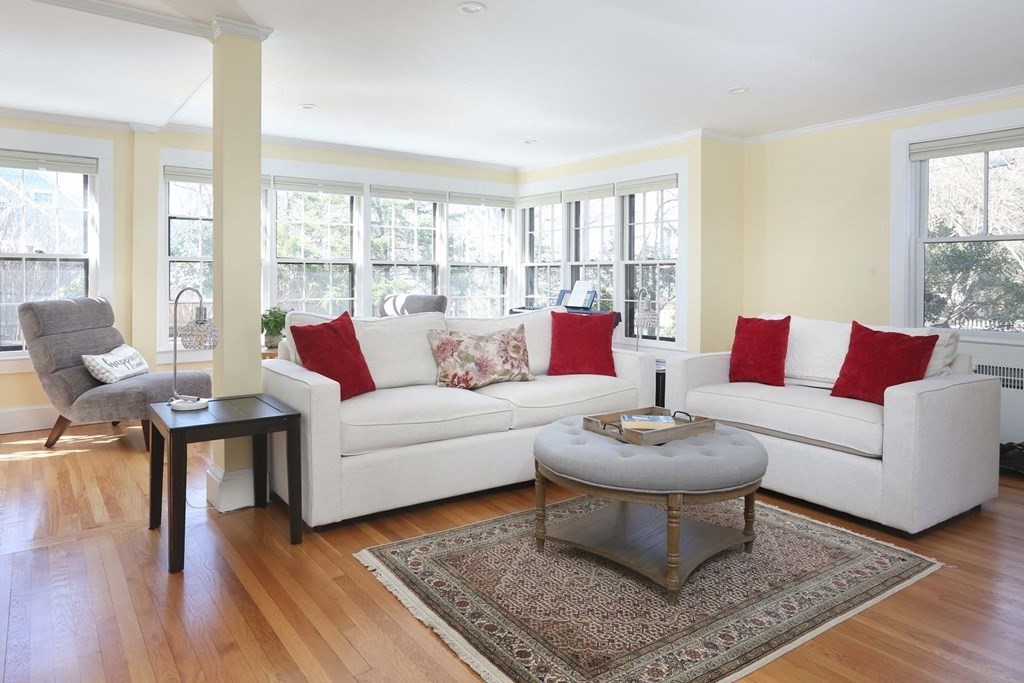 10 Beverly Road Newton, MA 02461 - Photo 5 of 19 a living room with furniture a rug and a large window