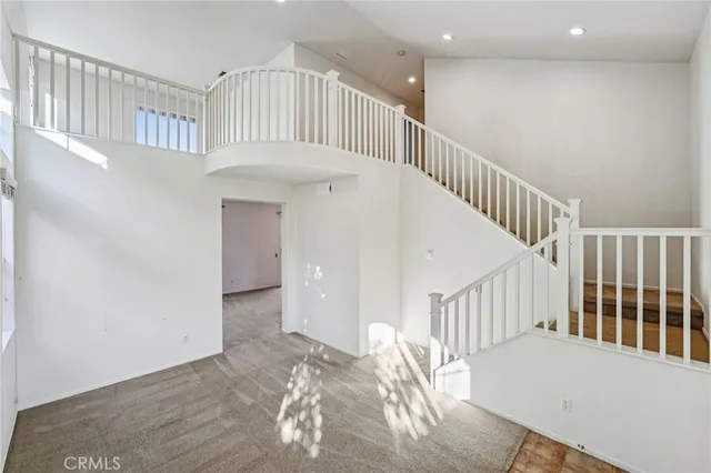 a view of entryway with stairs