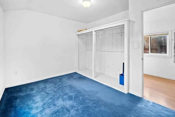 an empty room with window