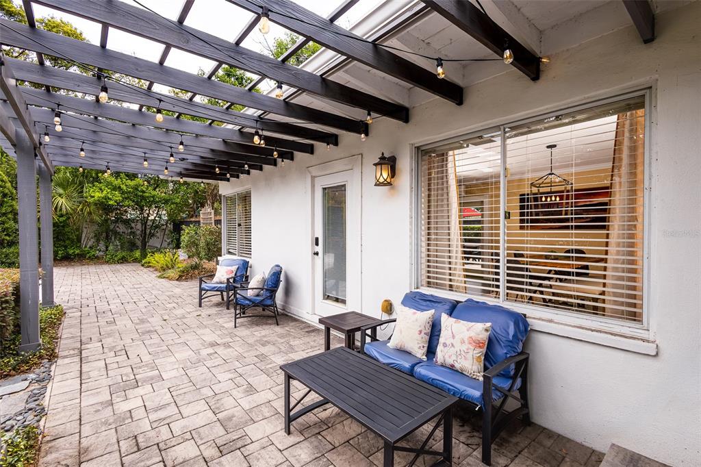 1001 Nottingham Street Orlando, FL 32803 - Photo 38 of 49 a outdoor living space with patio furniture and a grill