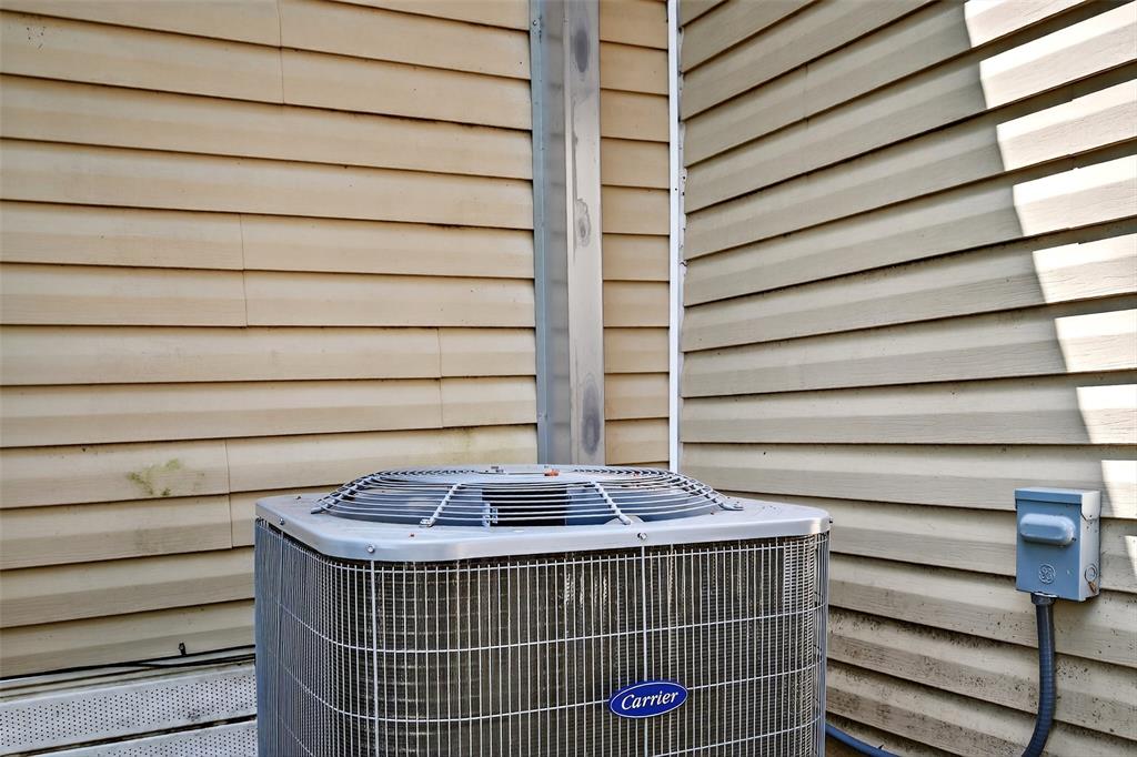 205 West Bond Street Denison, TX 75020 - Photo 23 of 23 Exterior view of a cooling unit