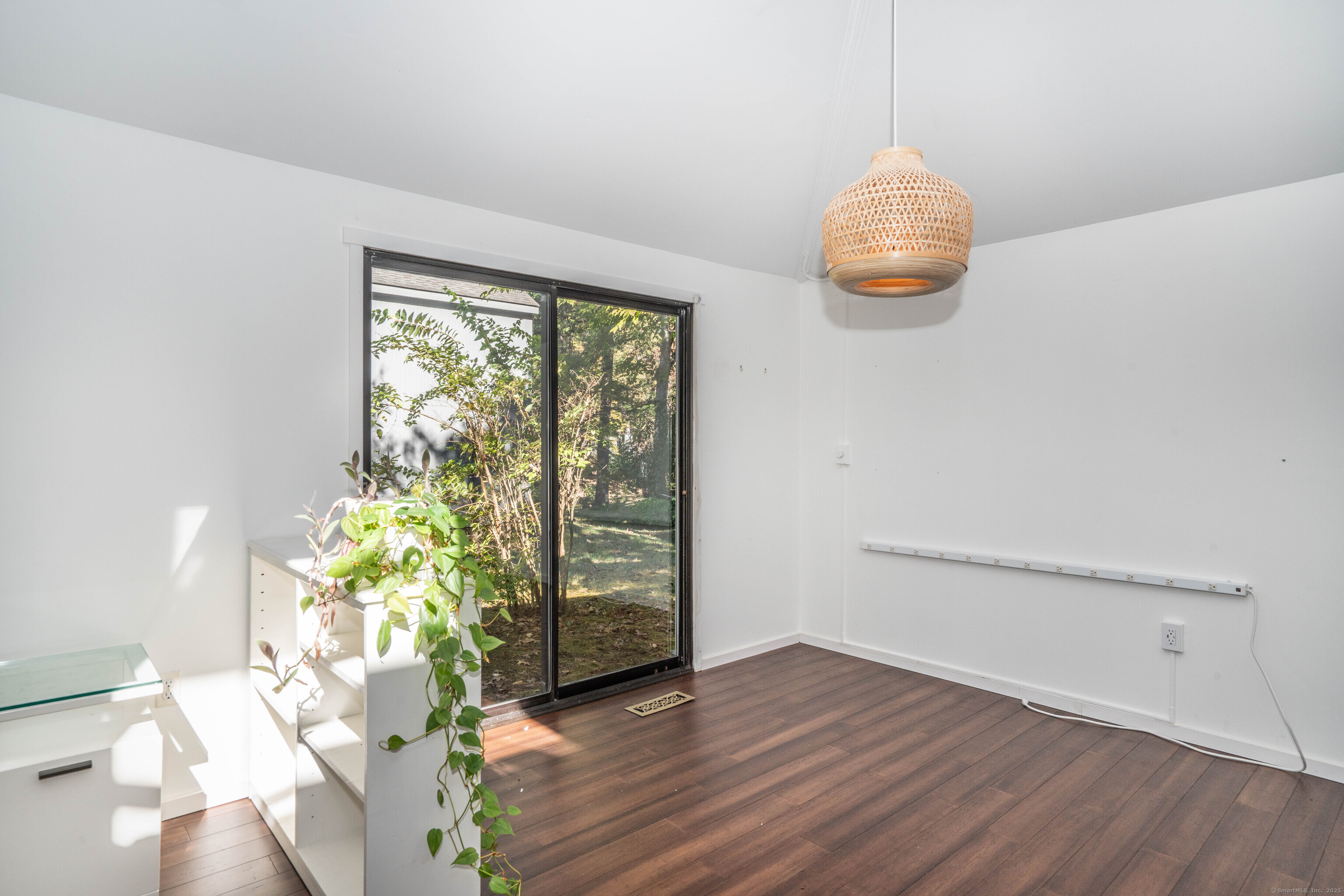 1 Morningside Court, Unit 1 Avon, CT 06001 - Photo 12 of 31 wooden floor in an empty room with a window