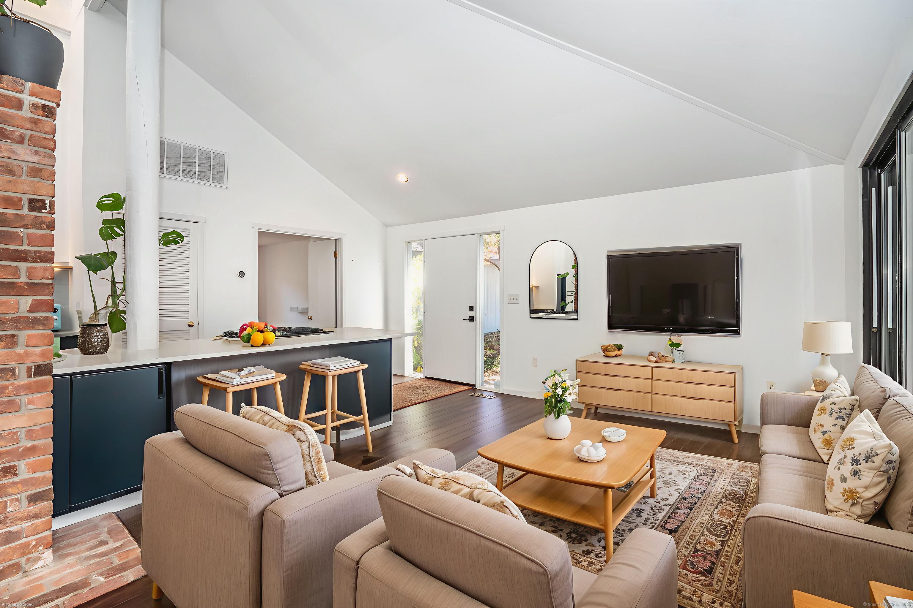 1 Morningside Court, Unit 1 Avon, CT 06001 - Photo 13 of 31 a living room with furniture and a flat screen tv