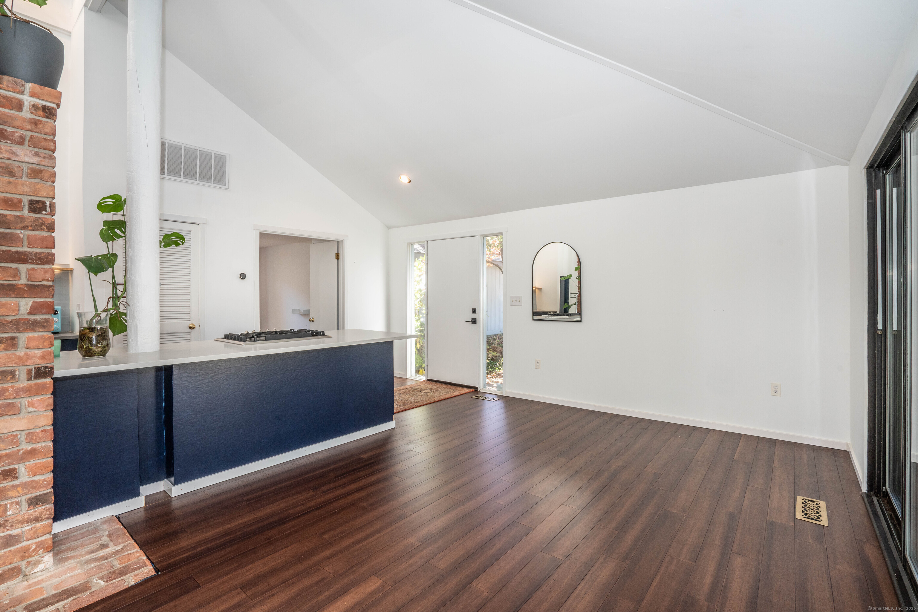 1 Morningside Court, Unit 1 Avon, CT 06001 - Photo 14 of 31 a view of an empty room with window and wooden floor