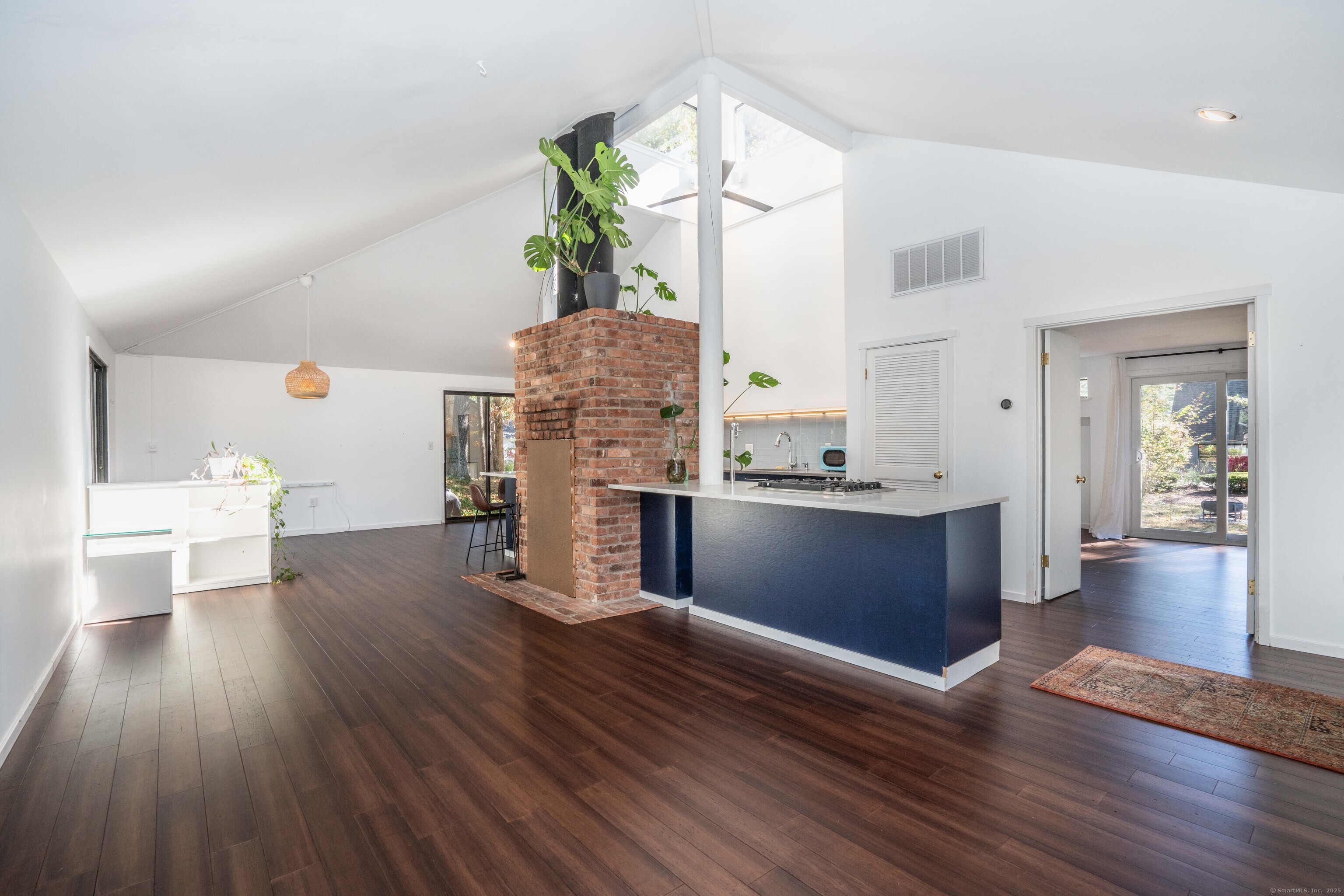 1 Morningside Court, Unit 1 Avon, CT 06001 - Photo 15 of 31 a living room with furniture and wooden floor