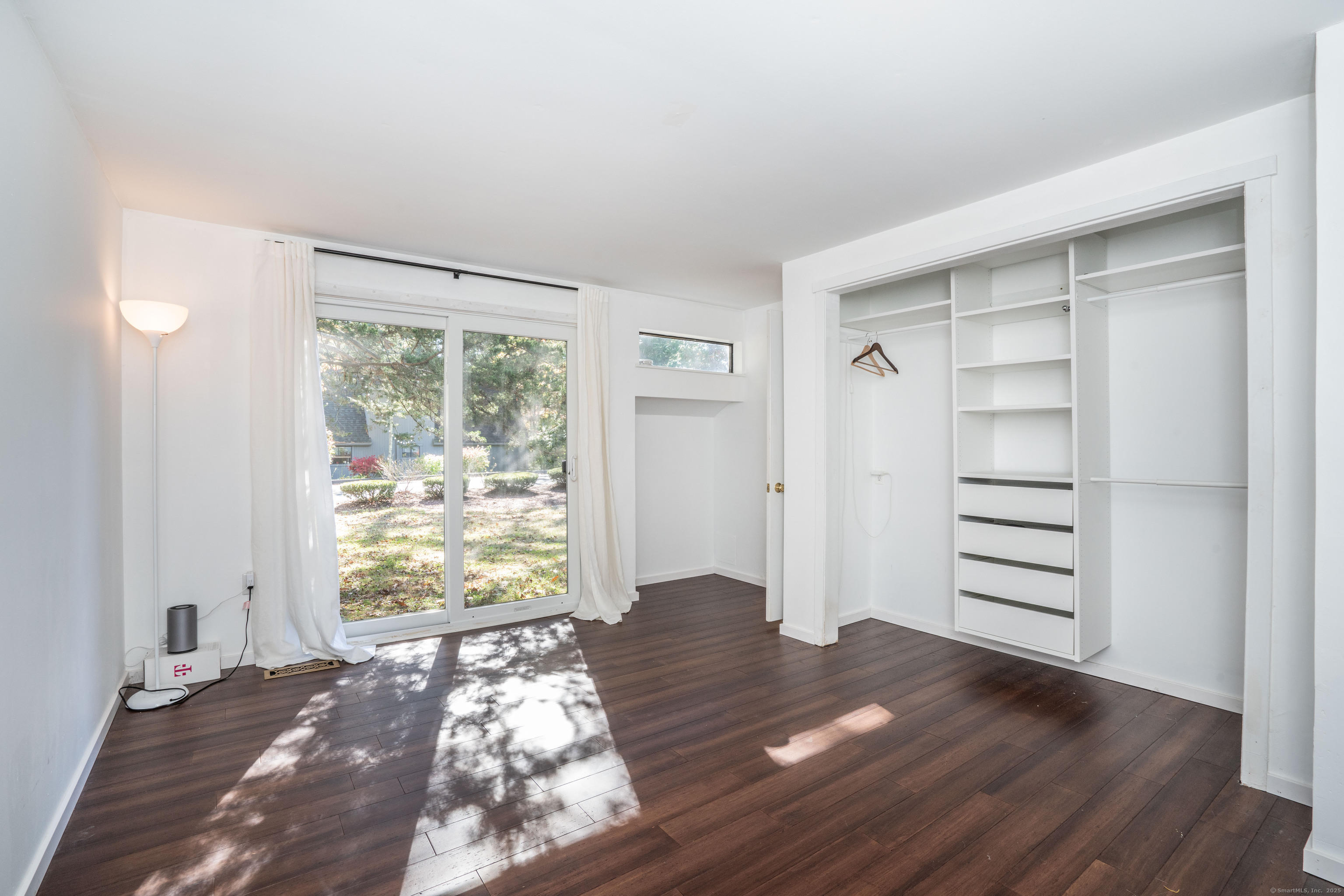 1 Morningside Court, Unit 1 Avon, CT 06001 - Photo 19 of 31 a view of walk in closet with empty racks