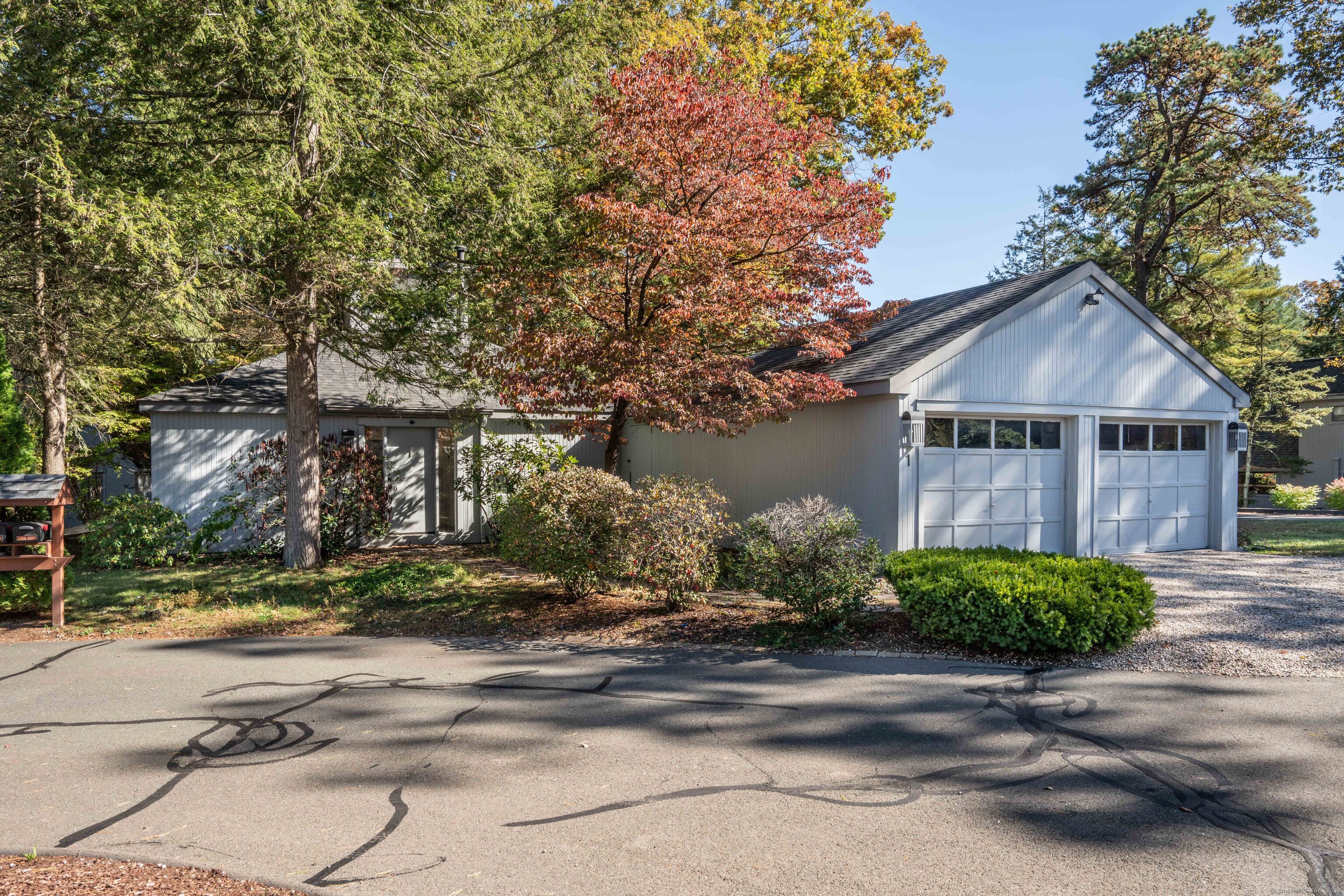 1 Morningside Court, Unit 1 Avon, CT 06001 - Photo 2 of 31 front view of a house with a street
