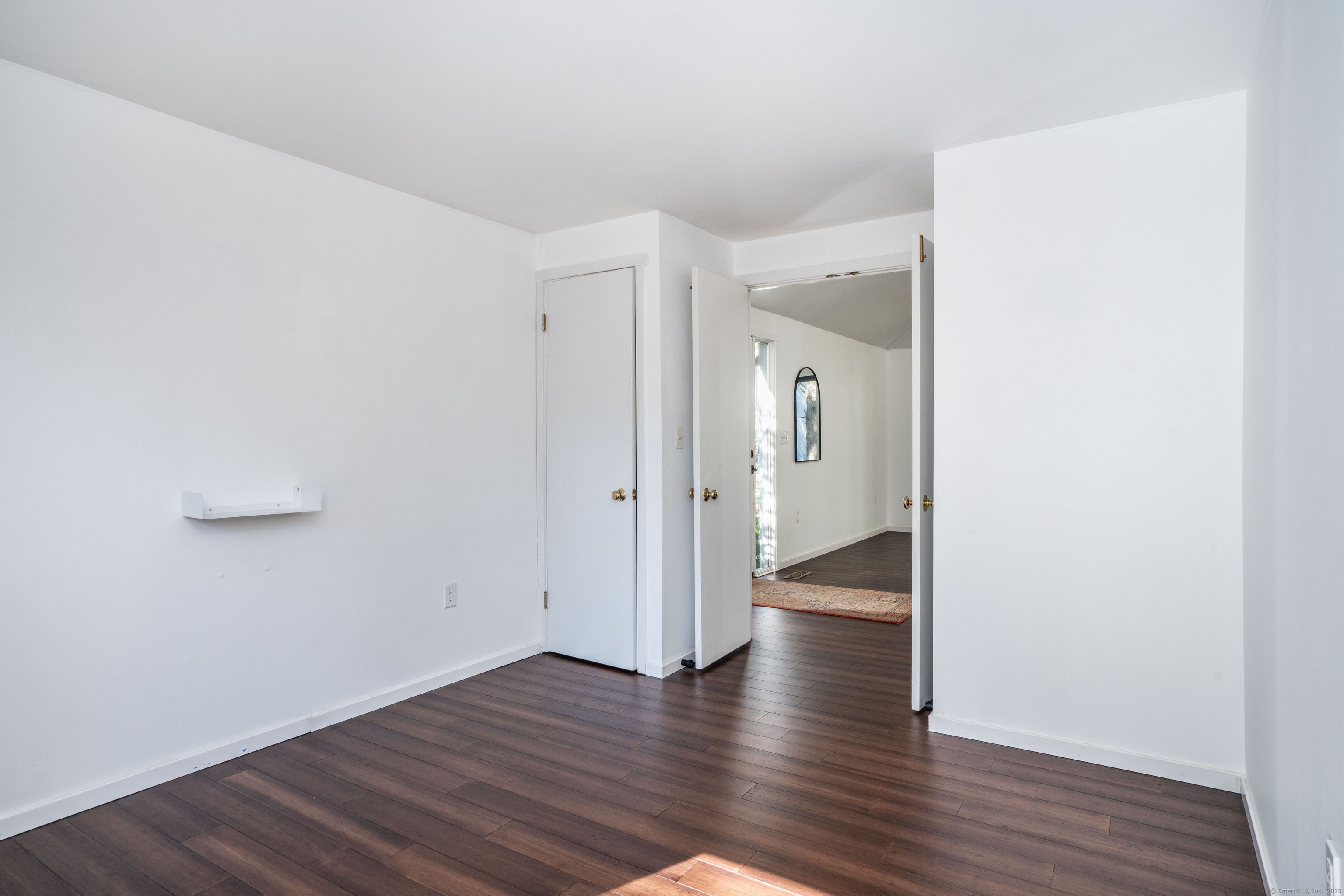 1 Morningside Court, Unit 1 Avon, CT 06001 - Photo 21 of 31 a view of an empty room with wooden floor