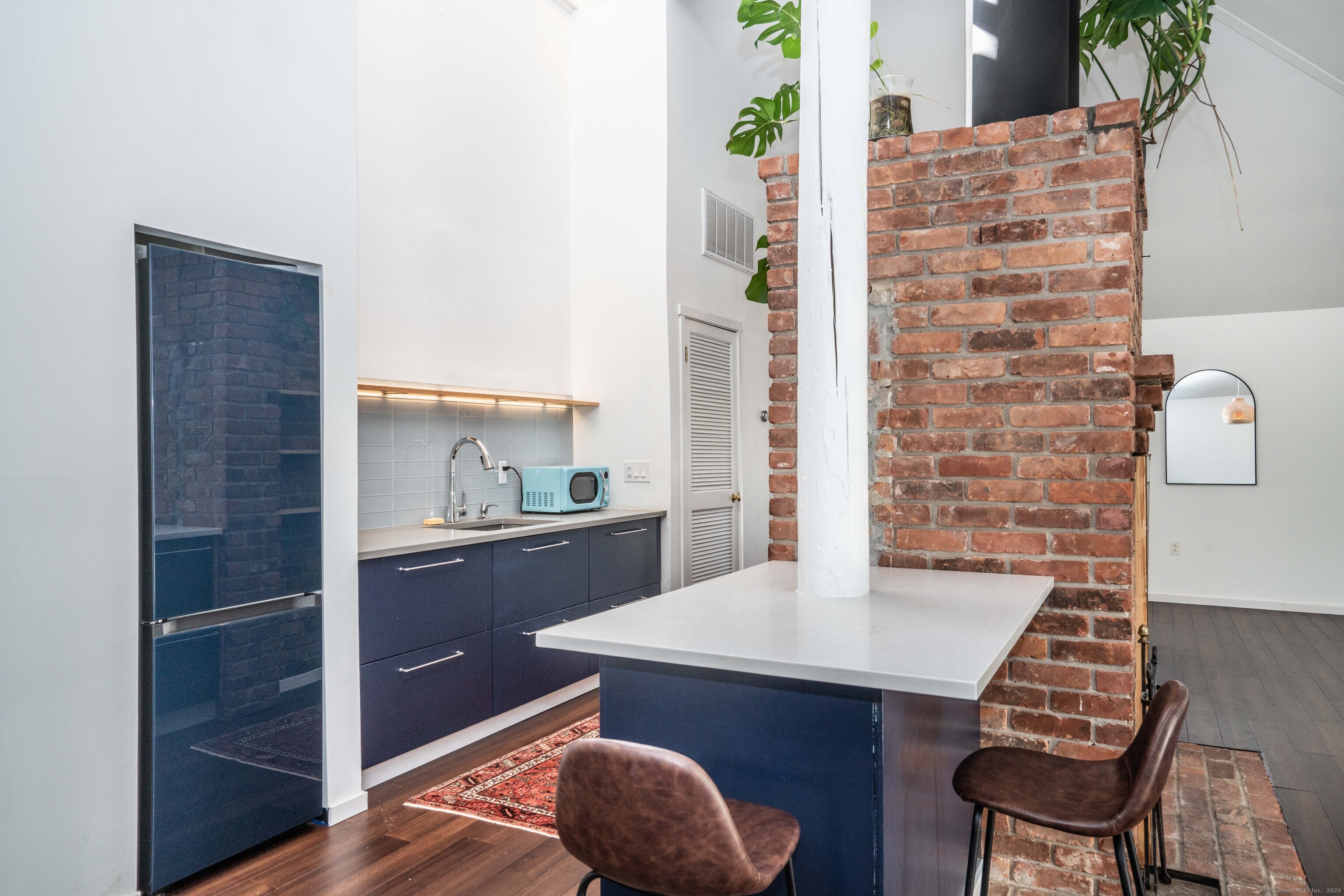 1 Morningside Court, Unit 1 Avon, CT 06001 - Photo 10 of 31 a kitchen with a table and chairs in it