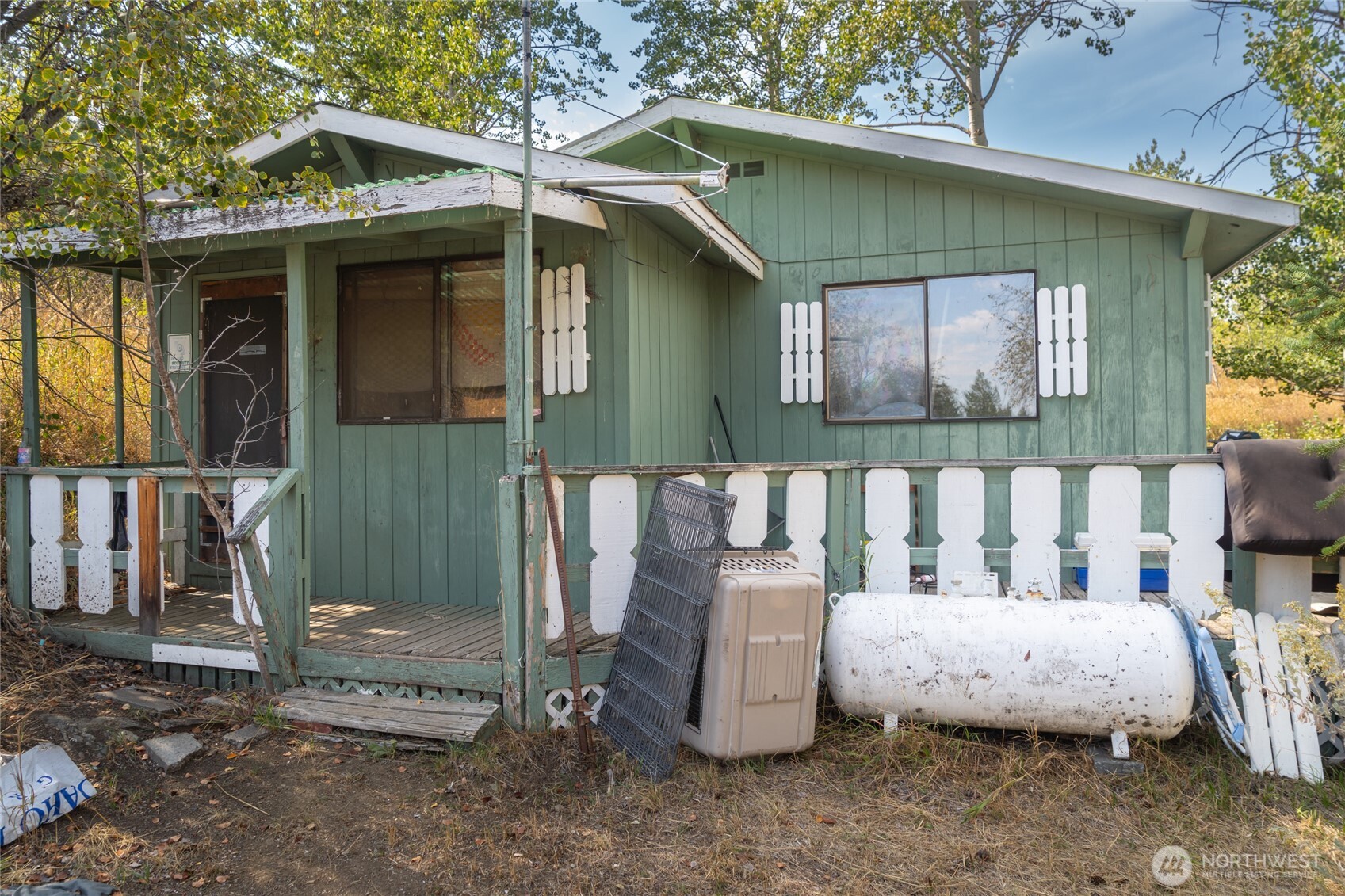 653 B Ellemeham Mountain Road Oroville, WA 98844 - Photo 4 of 33 a view of a chair and table in the house