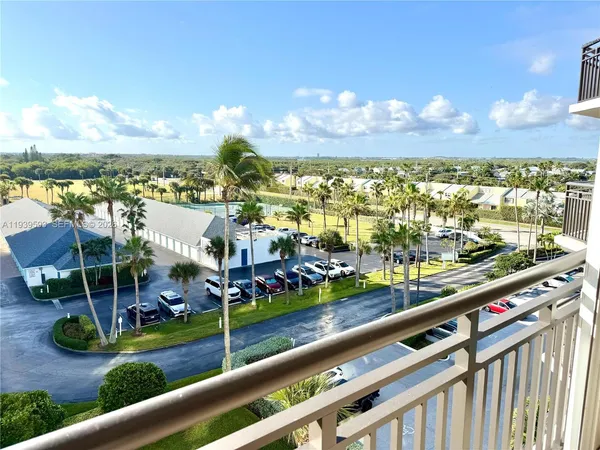 a view of swimming pool from a balcony
