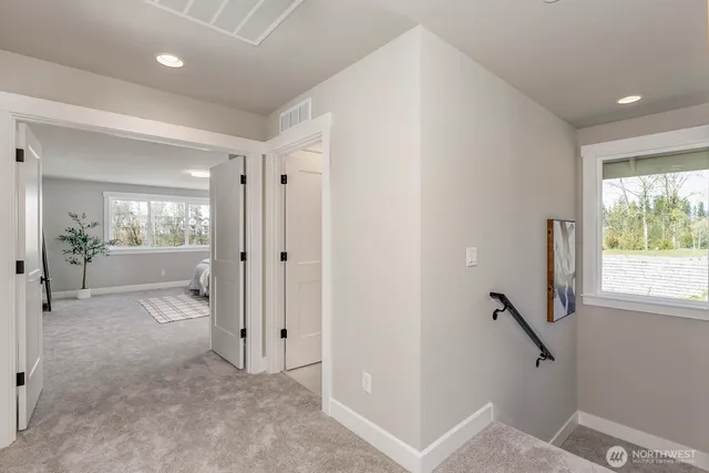 a view of livingroom with hardwood floor and a ceiling fan
