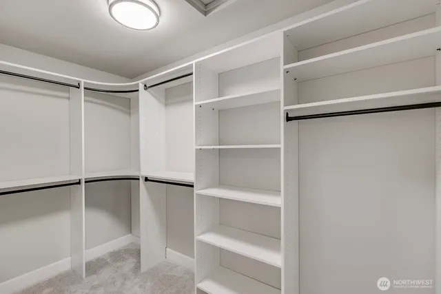 a view of an empty walk in closet