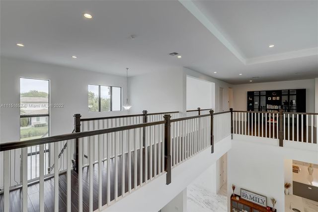 a view of a balcony with ocean view